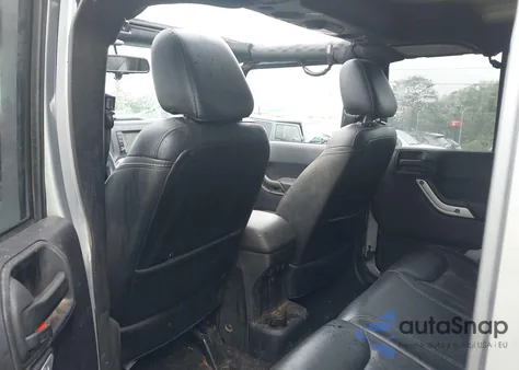 2015 Jeep Wrangler Unlimited Sahara from USA, damaged, VIN 1C4BJWEGXFL646961